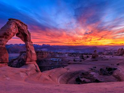 Delicate Arch and Sandstone Bowl at Sunset