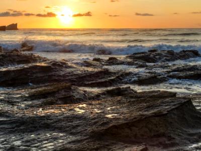 Playa Pelada Sunset on Waves of Rock
